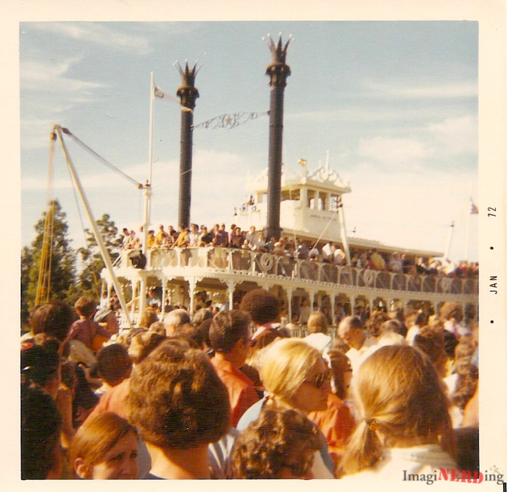 vintage magic kingdom photos The Admiral Joe Fowler overlooks the queue for the Haunted Mansion.