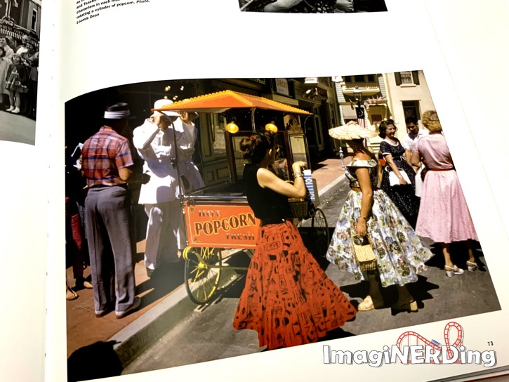 an image of people standing by the popcorn cart at Disneyland from Walt Disney's Disneyland book