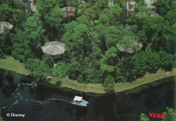 Treehouse Villas at Lake Buena Vista seen from above with a boat passing by on the river.