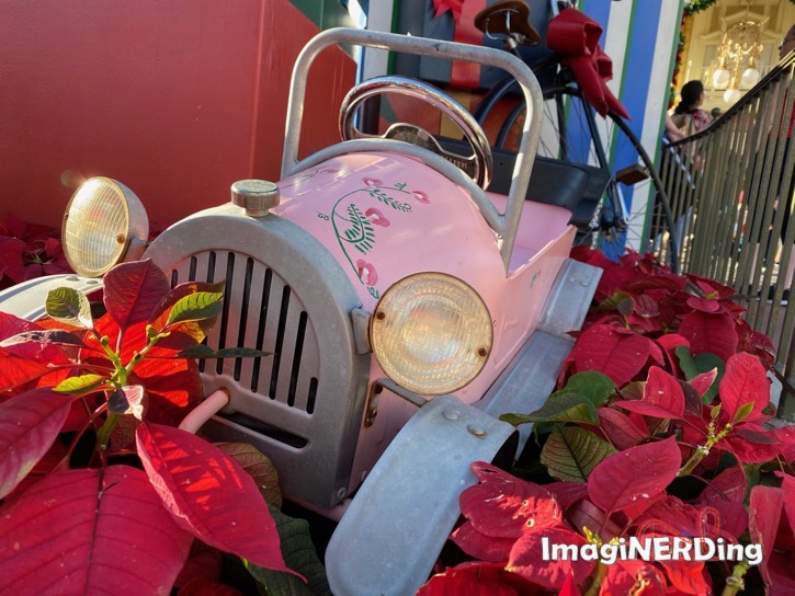 close up of one of the children's toy vehicle undertake christmas tree a the magic kingdom