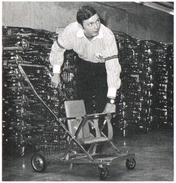 image of a cast member putting together strollers at the magic kingdom in 1972